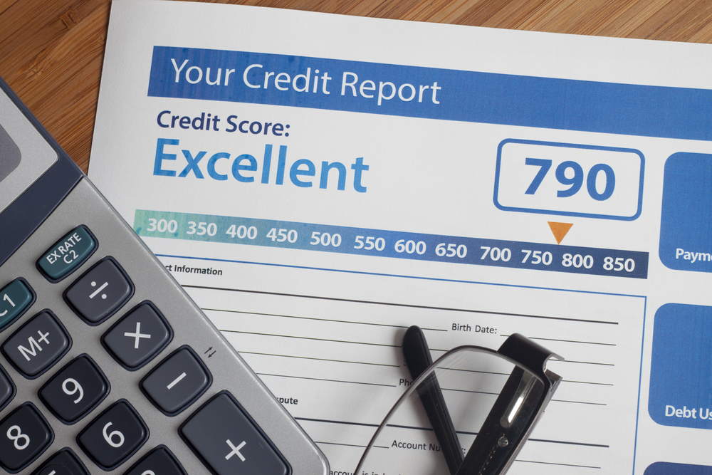 paper of credit report on table with credit score